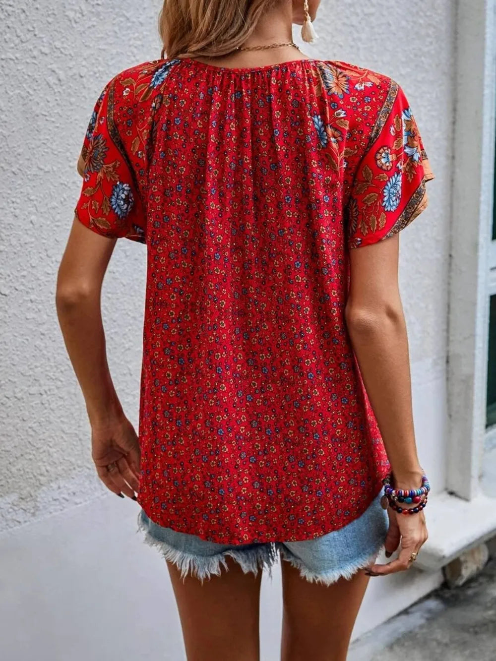Floral-print tie-neck blouse