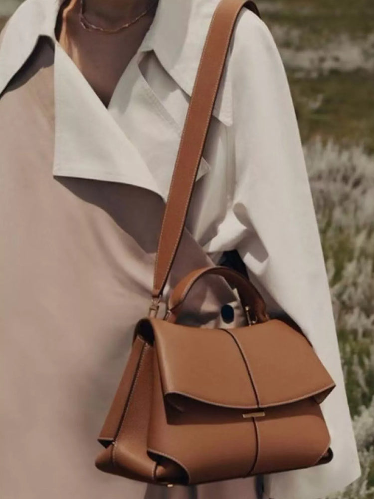 Caramel cowhide top-handle bag from the ALMA VENN Women's Bags edit